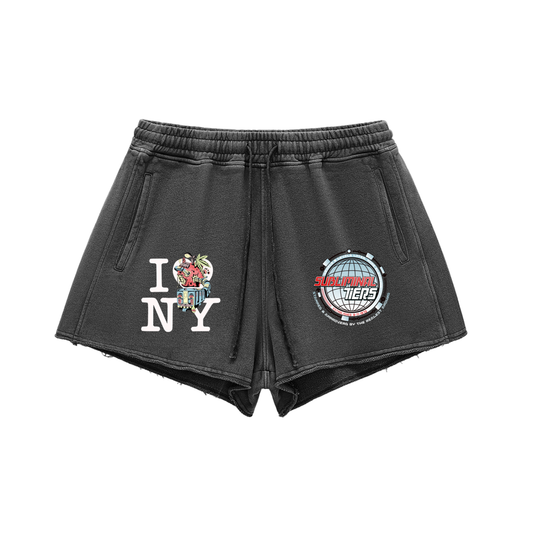 Black sweat shorts with a distressed wash, featuring a 'I [heart] NY' graphic with a rose on the left leg and a circular 'Super Bowl Champions' logo on the right leg, set against a plain white background.